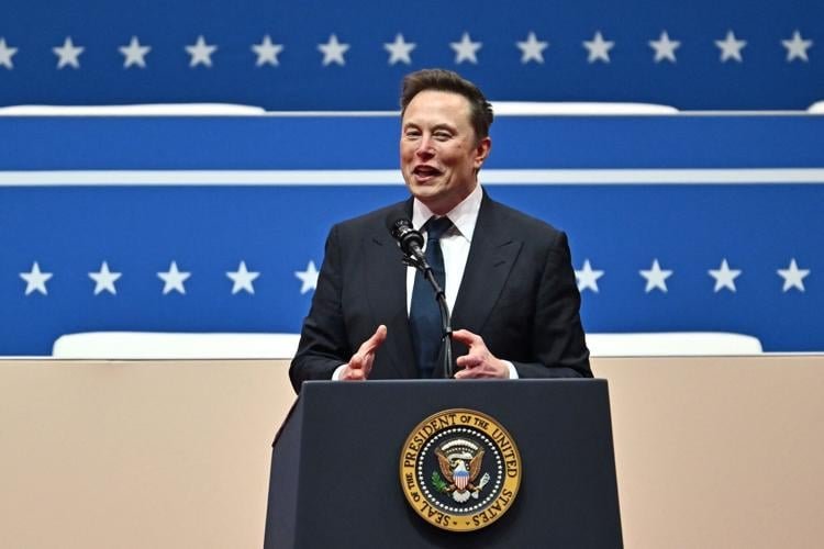 Elon musk Elon Musk speaking passionately during a public address.