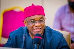 David Mark speaking at a political meeting as a key figure in the opposition coalition group.