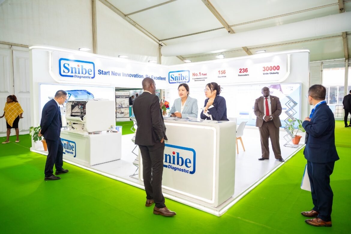 Nairobi Kenya Healthcare professionals interact at a diagnostic technology exhibition booth during WHX Labs Nairobi 2025 in Nairobi Kenya.
