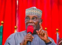 Atiku Abubakar delivering a passionate speech at a political event.
