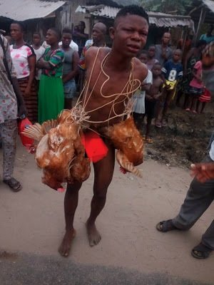 Young boy paraded naked for continues stealing of chicken in a community Young boy in Ogoni paraded naked by villagers after being caught stealing chickens multiple times.