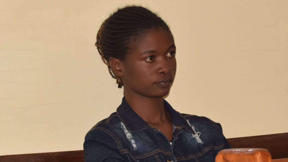 Woman caught by police A shocked crowd in Lagos gathers around a woman accused of cooking with her menstrual blood for her lover.