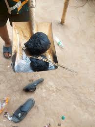 Man caught with charm (poison) Man secretly caught on camera burying suspected evil charm at his neighbour’s doorstep at night.