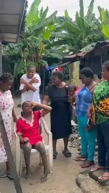 Crippled woman A heartbroken crippled woman sits in tears after being abandoned by the man who impregnated her.