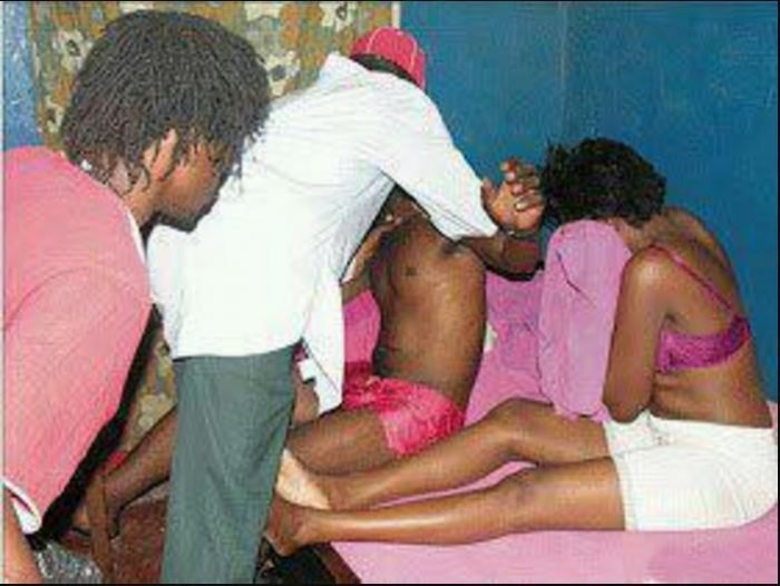 Man caught sleeping with his 19yrs old daughter Sad young woman looking down while people whisper in the background – symbol of family scandal and betrayal