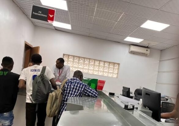 Bank issues Man shouting inside bank over repeated debit alerts.