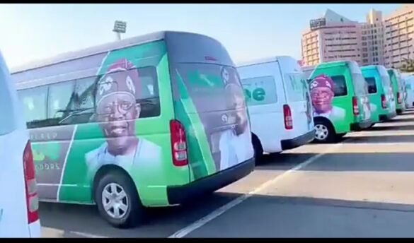 A row of newly distributed Hilux vehicles and a Hummer bus parked outdoors, prepared for political campaign use ahead of the 2027 elections in Nigeria.