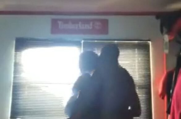 CCTV camera inside a living room captures a housemaid behaving inappropriately with an electrician while the homeowner is away.